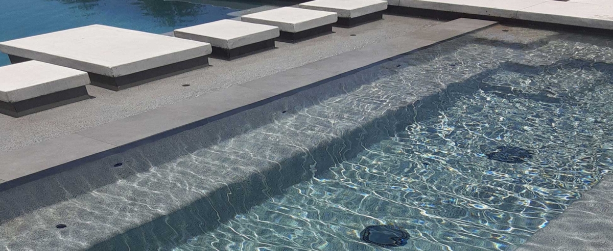 Universal Mini Pebble- French Grey pool with stepping stones