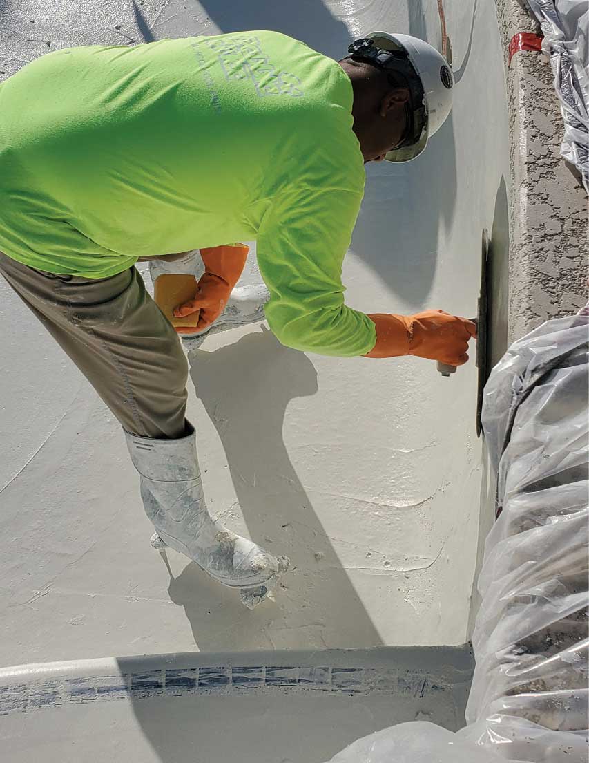 Pool Plasterer - Pool Contractor Plastering a Pool Interior Pool Plasterer - Pool Contractor Plastering a Pool Interior